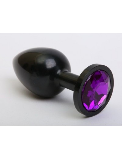 Чёрная анальная пробка с фиолетовым стразом - 7,6 см.