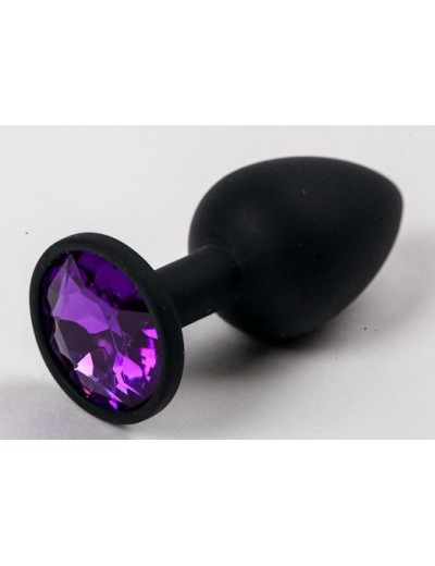 Черная силиконовая анальная пробка с фиолетовым стразом - 7,1 см.