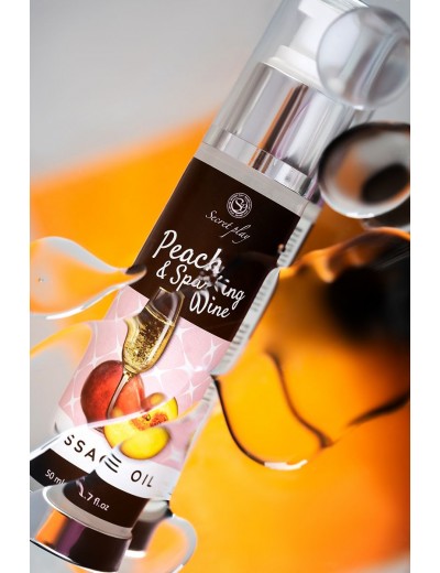 Массажное масло с ароматом персика и шампанского - 50 мл.