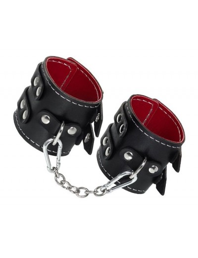 Черные наручники с двумя ремнями и красной подкладкой